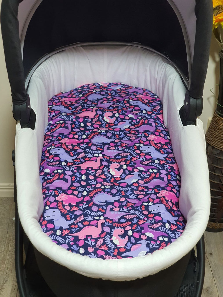 Pram bassinet liner-Pink and purple dinosaurs