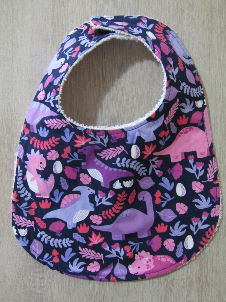 Flat baby bib-Pink,purple dinosaurs