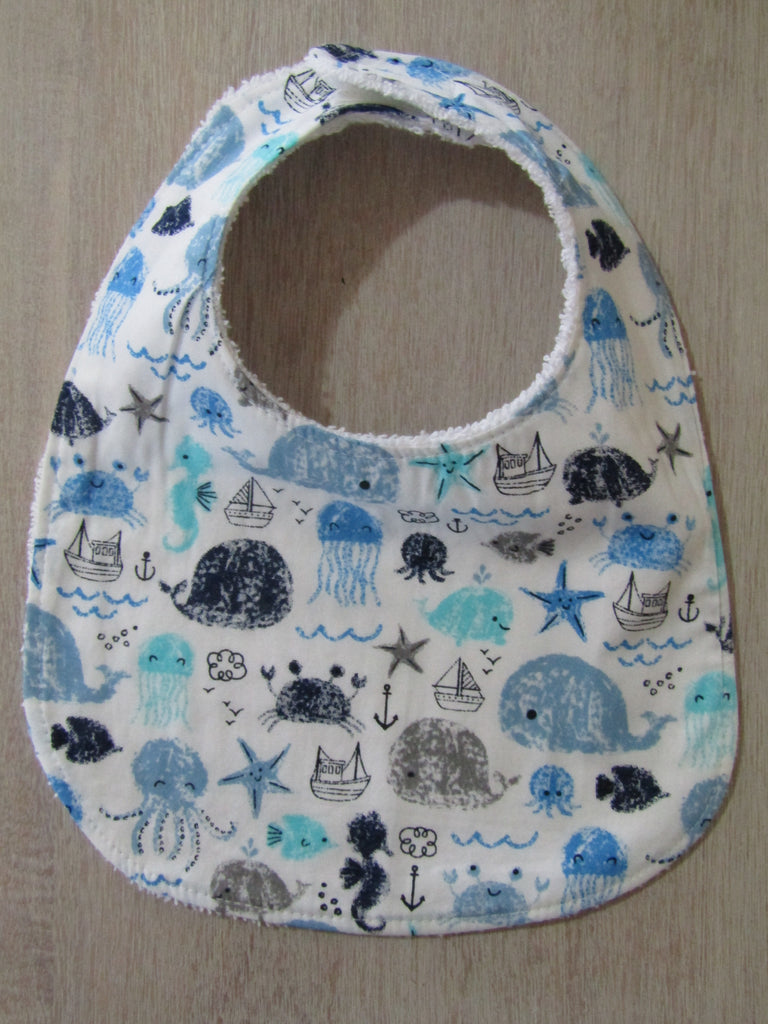 Flat baby bib-Friends at sea