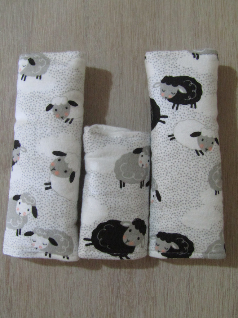 Baby capsule/car seat belt covers-Black & white sheep